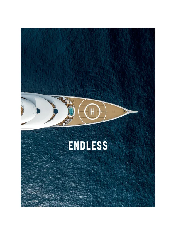 ENDLESS: aerial view of a superyacht bow on deep blue water